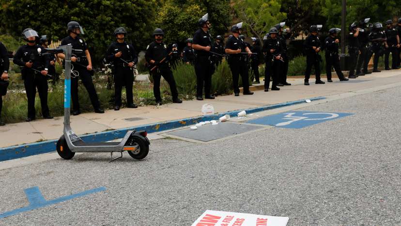 Police officers stand guard at the University of California, Los Angeles (UCLA)