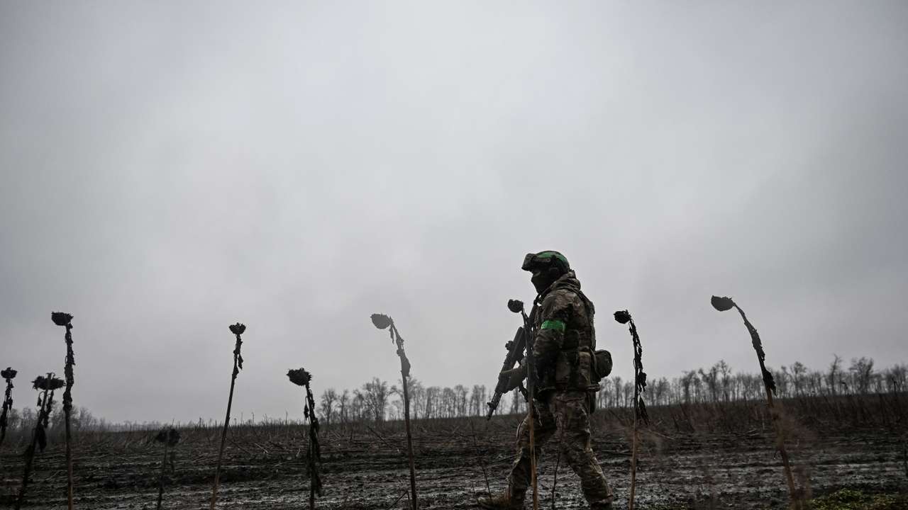 A serviceman walks at a position in a front line near the town of Pokrovsk