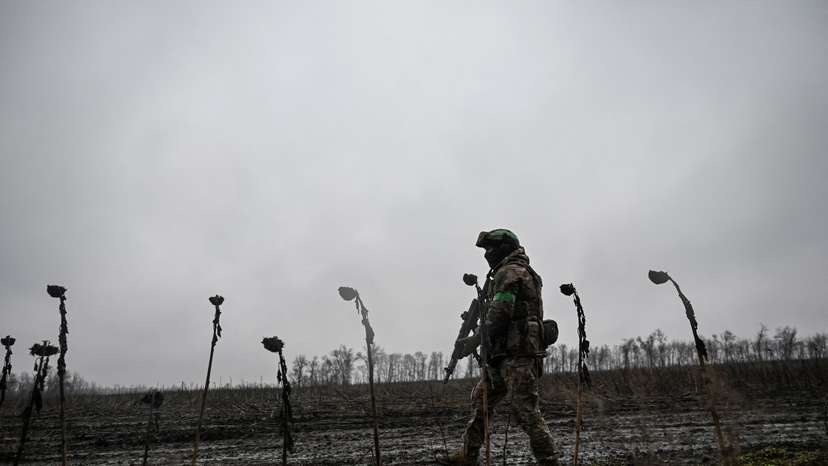 A serviceman walks at a position in a front line near the town of Pokrovsk