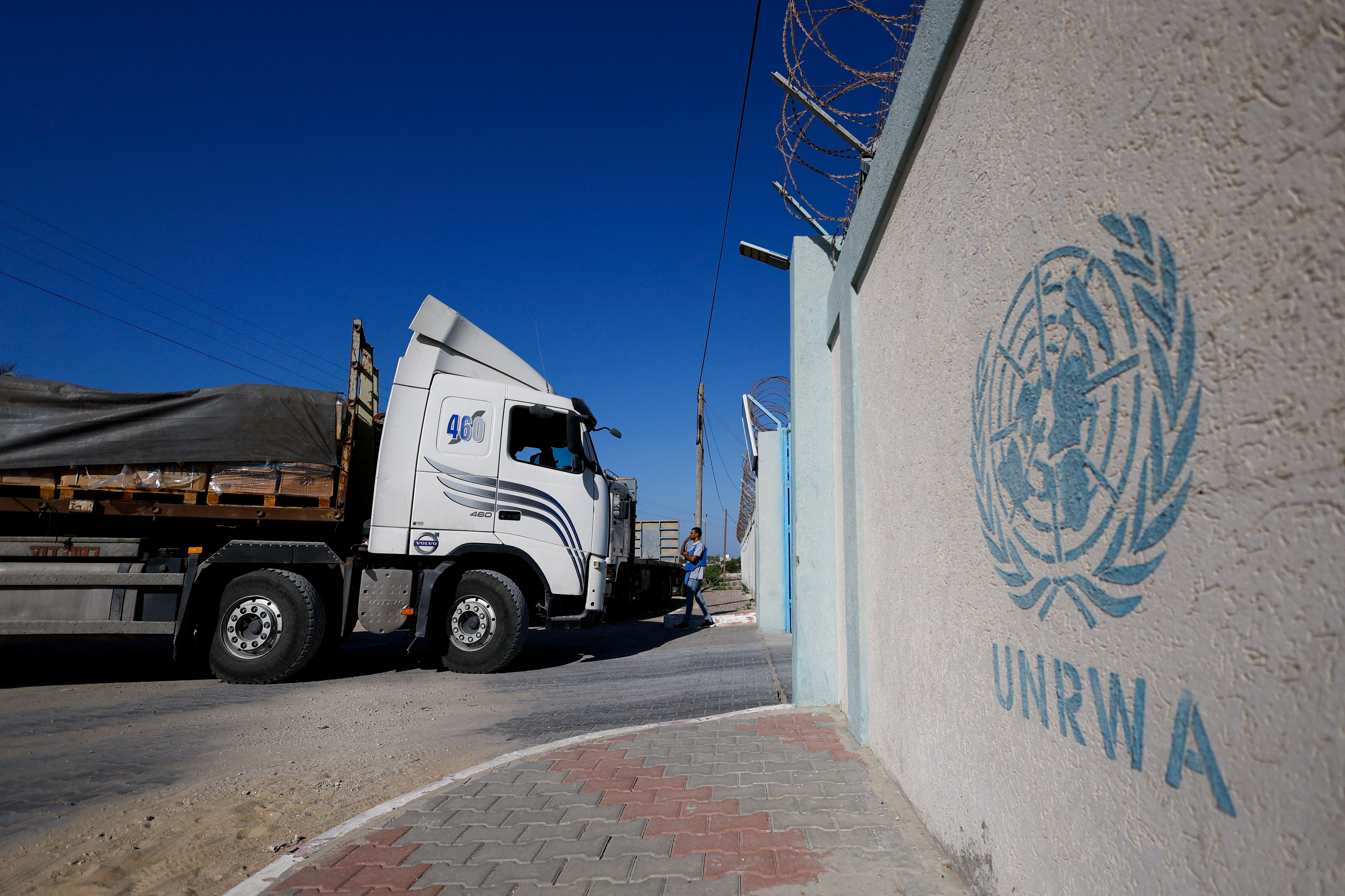 FILE PHOTO: Aid trucks arrive at a UN storage facility in the central Gaza Strip