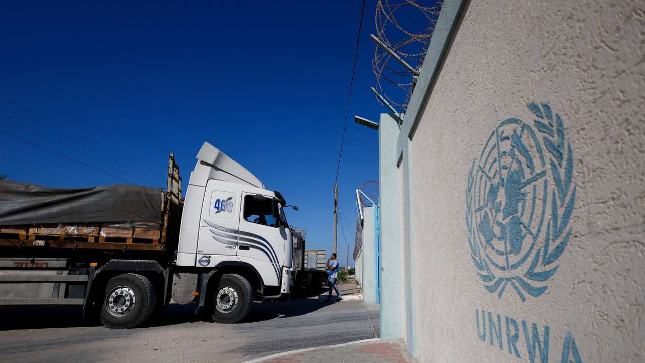 FILE PHOTO: Aid trucks arrive at a UN storage facility in the central Gaza Strip