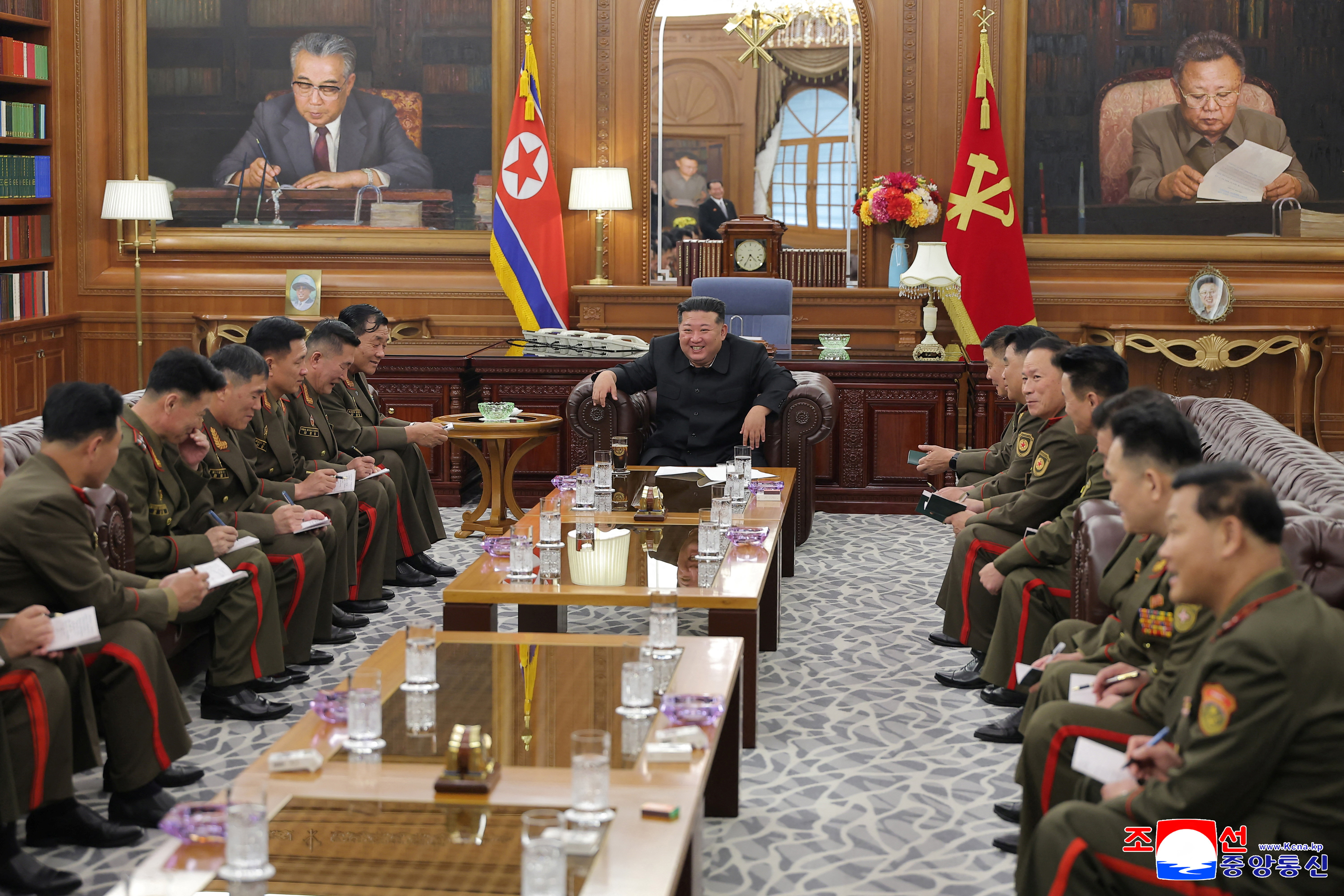 North Korean leader Kim Jong attends a meeting with officers of the army's overseas operation, in Pyongyang