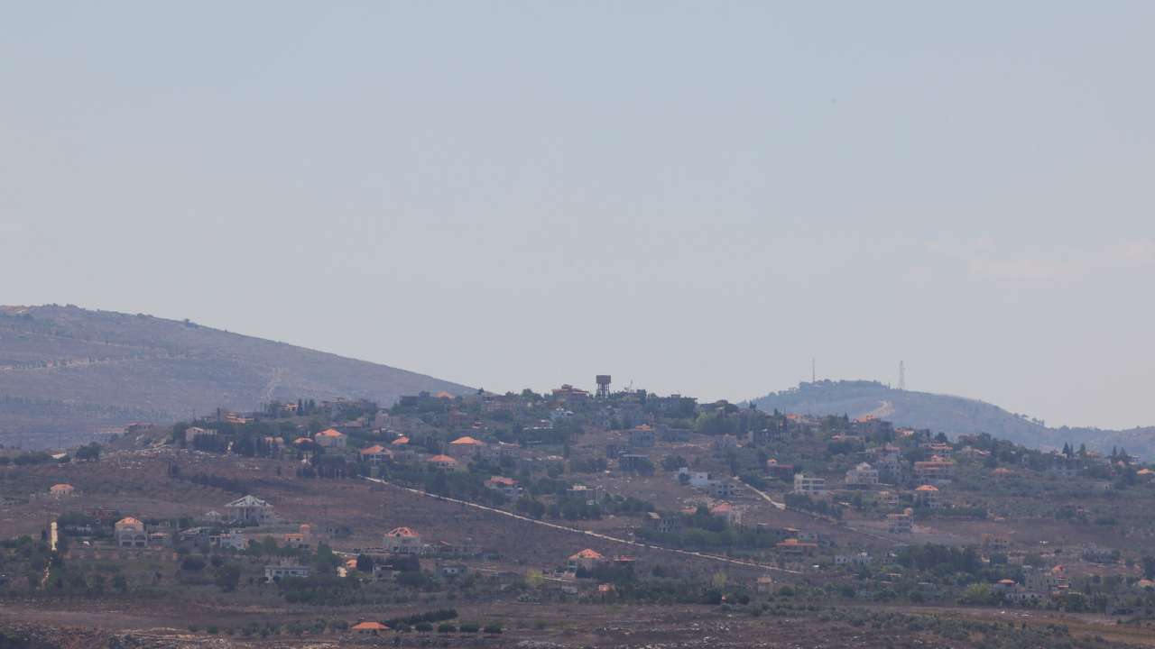 A general view shows villages near the Lebanese-Israeli border, as pictured through a balcony in Kamel Mroue's house, in Yohmor, Nabatieh governorate