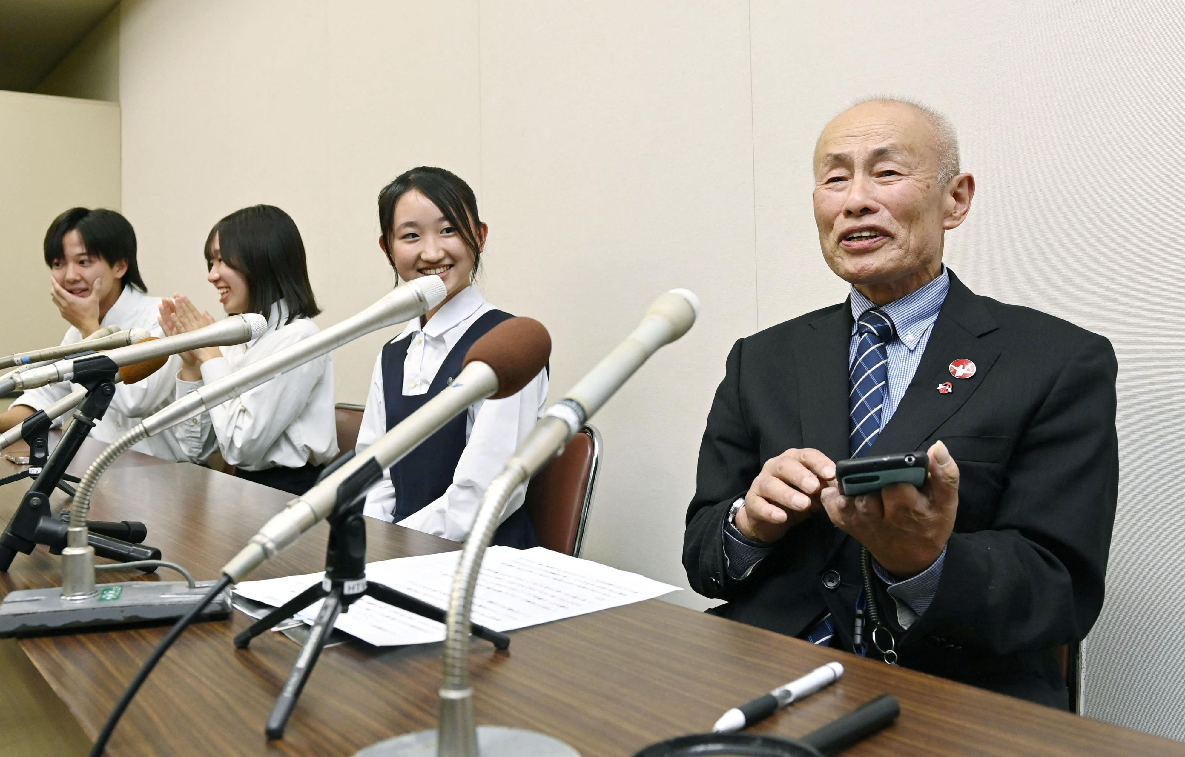 Japan Confederation of A- and H-Bomb Sufferers’ Organizations (Nihon Hidankyo) co-chair Toshiyuki Mimaki attends a news conference in Hiroshima