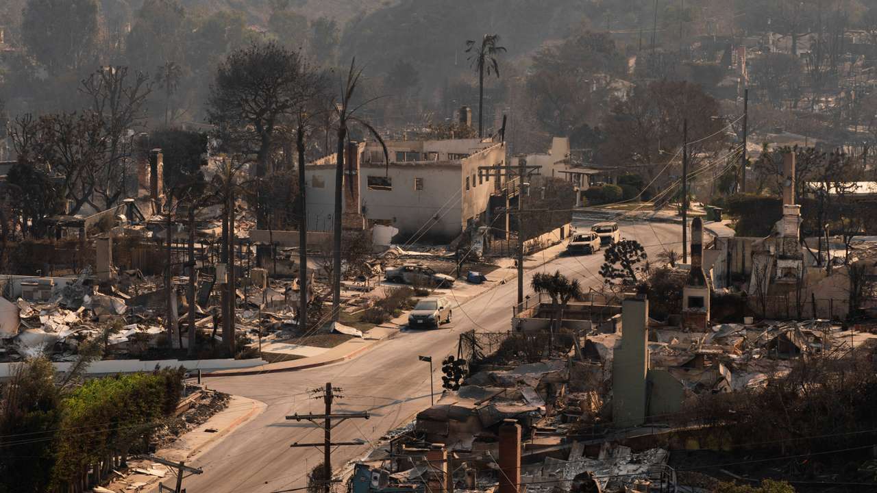 The remains of homes following the Palisades Fire in the Pacific Palisades neighborhood in Los Angeles