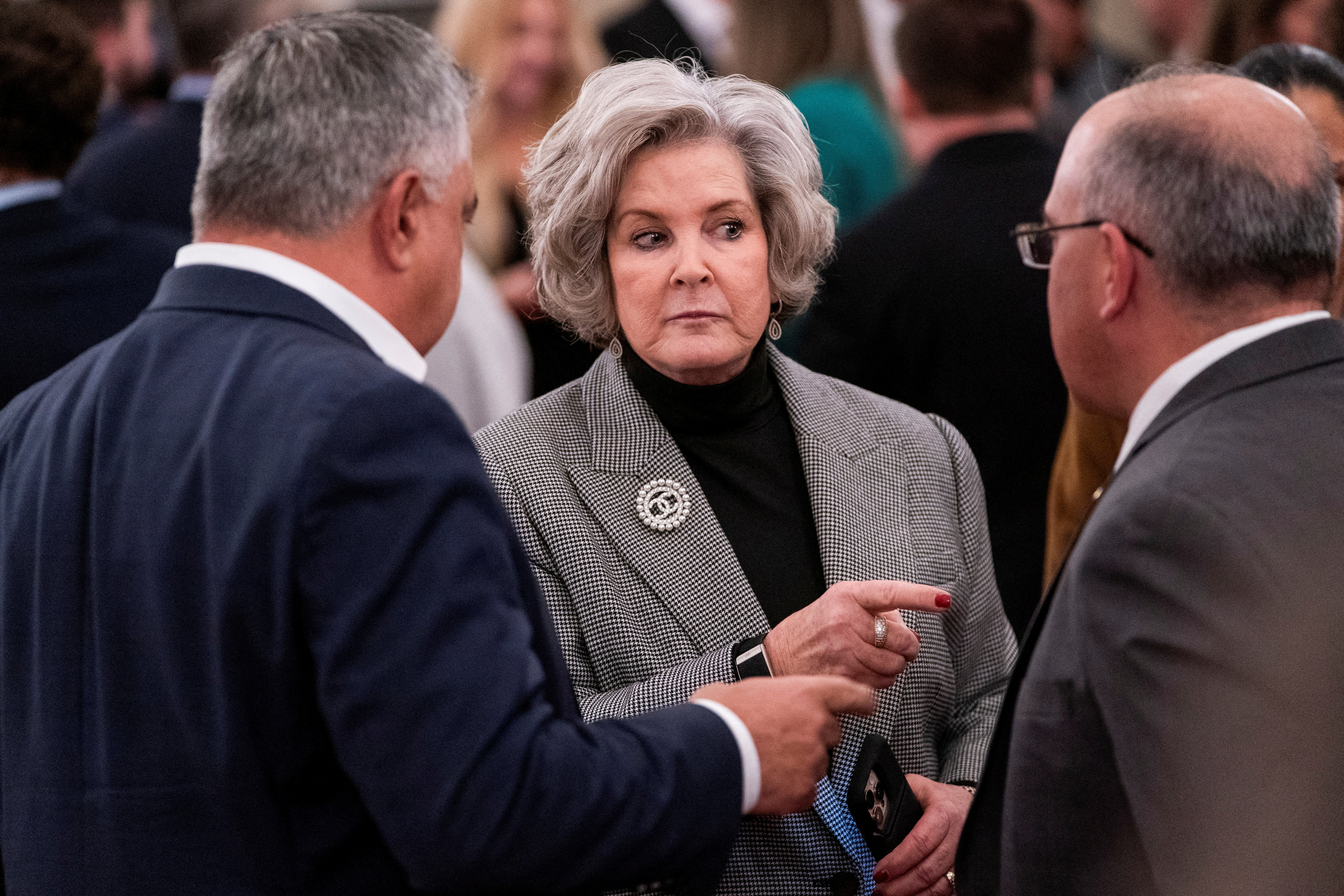 FILE PHOTO: White House Chief of Staff Susie Wiles speaks with fellow attendees during a reception for Sergio Gor, the recently sworn-in U.S. Ambassador to India, at the Kennedy Center in Washington