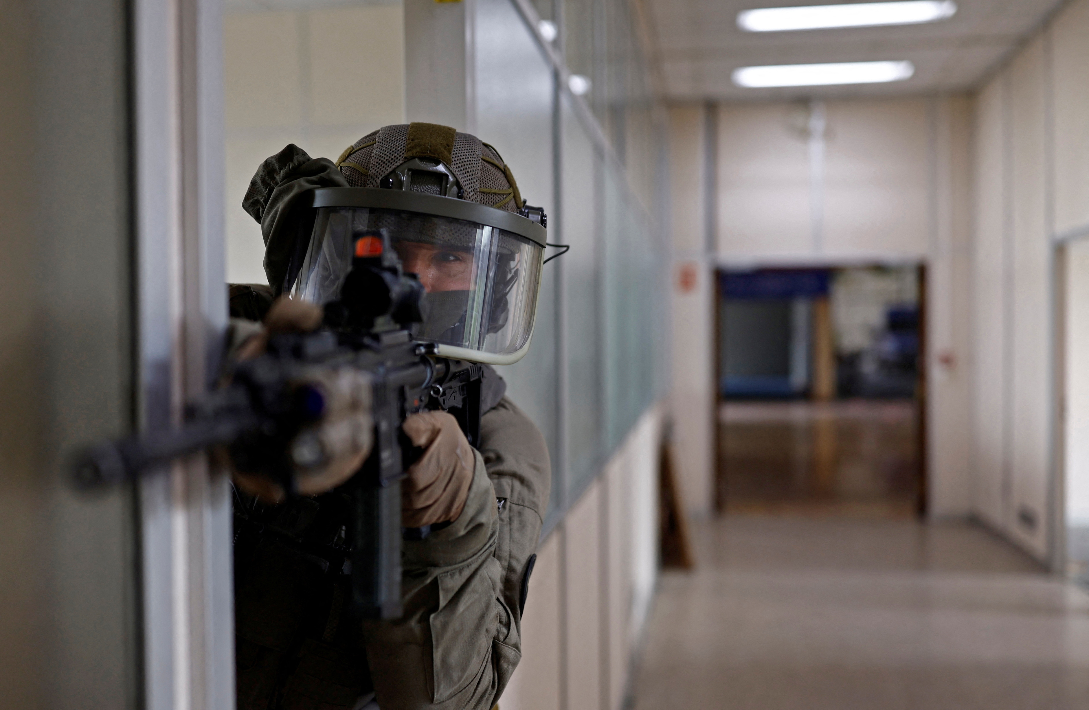 Gendarmes of the French National Gendarmerie Intervention Group (GIGN) take part in a drill near Paris