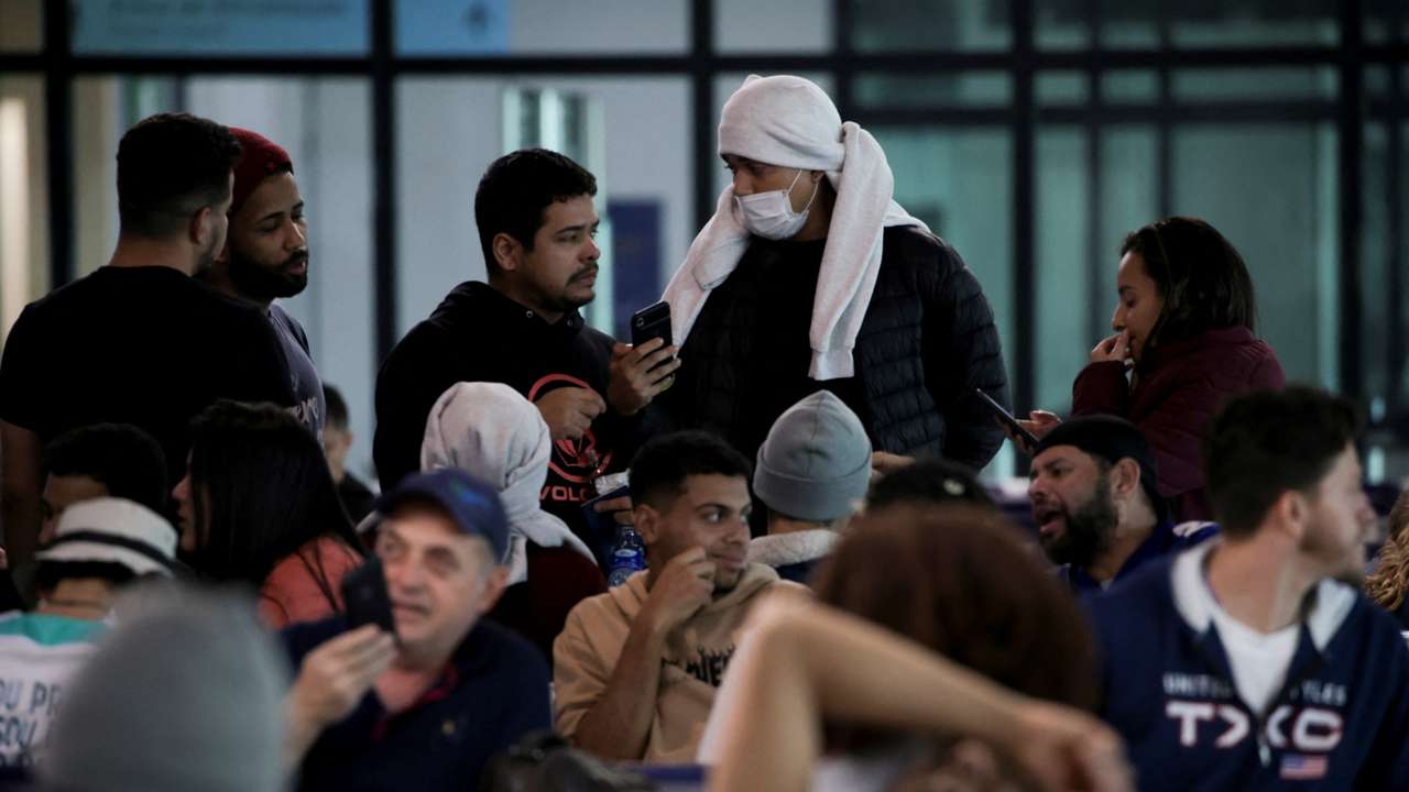 Brazilian migrants deported from the U.S. under President Trump's administration, board a Brazilian Air Force flight, in Manaus