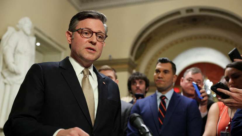 FILE PHOTO: U.S. House Speaker Johnson speaks to reporters at the Capitol in Washington