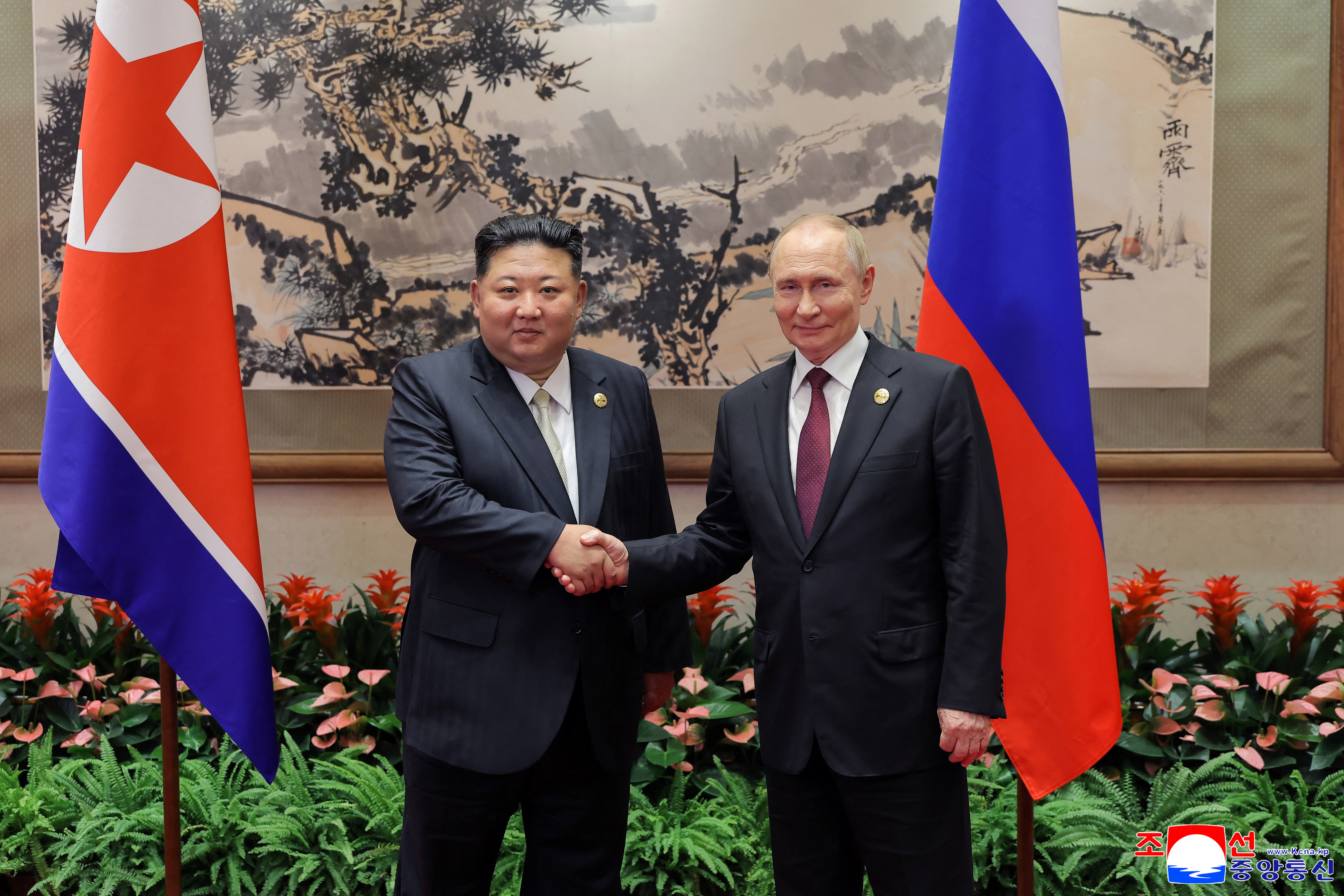 North Korean leader Kim Jong Un and Russian President Vladimir Putin attend a ceremony to mark the 80th anniversary of the end of World War Two, in Beijing