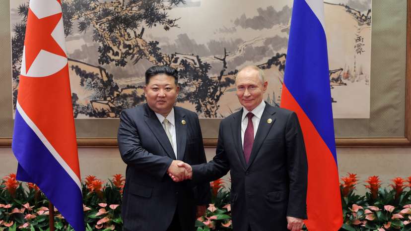 North Korean leader Kim Jong Un and Russian President Vladimir Putin attend a ceremony to mark the 80th anniversary of the end of World War Two, in Beijing
