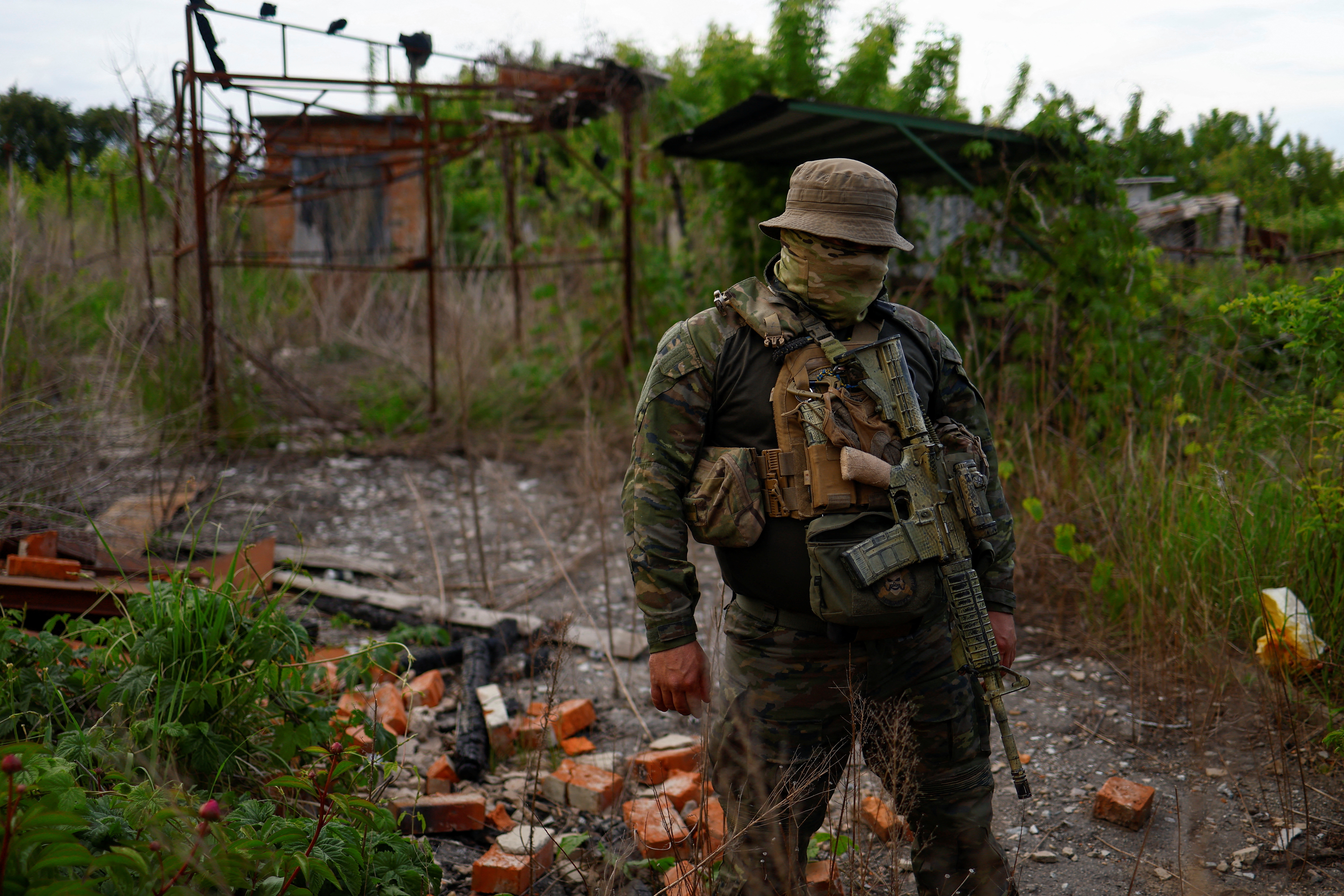 Member of the Freedom of Russia Legion with the call sign 'Winnie' speaks with Reuters before his return to fight with Russian troops near the border in Kharkiv region