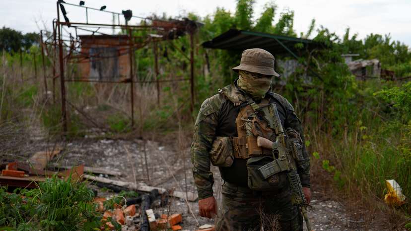 Member of the Freedom of Russia Legion with the call sign 'Winnie' speaks with Reuters before his return to fight with Russian troops near the border in Kharkiv region