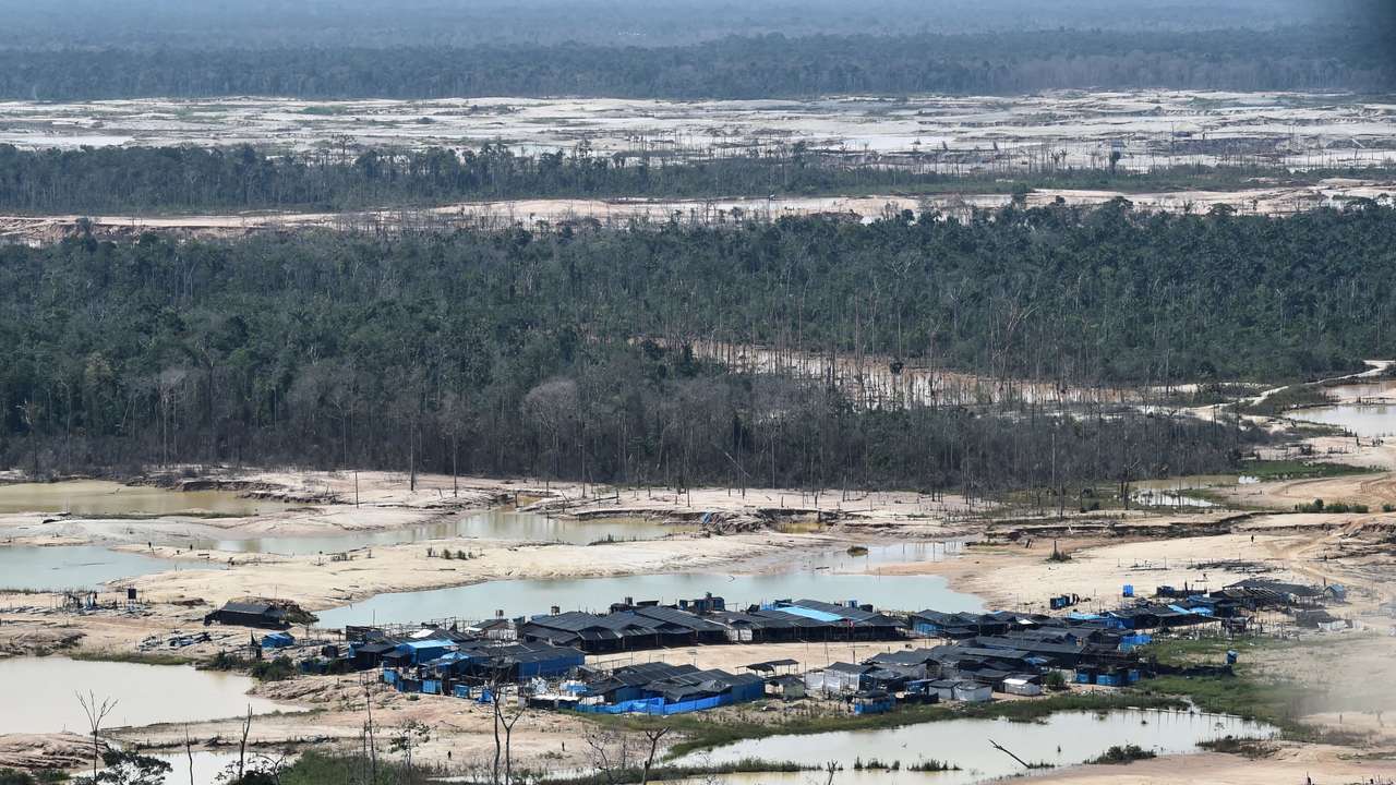 FILE PHOTO: A view shows an illegal gold mining camp during a police operation to destroy illegal machinery and equipment used by wildcat miners in Madre de Dios,