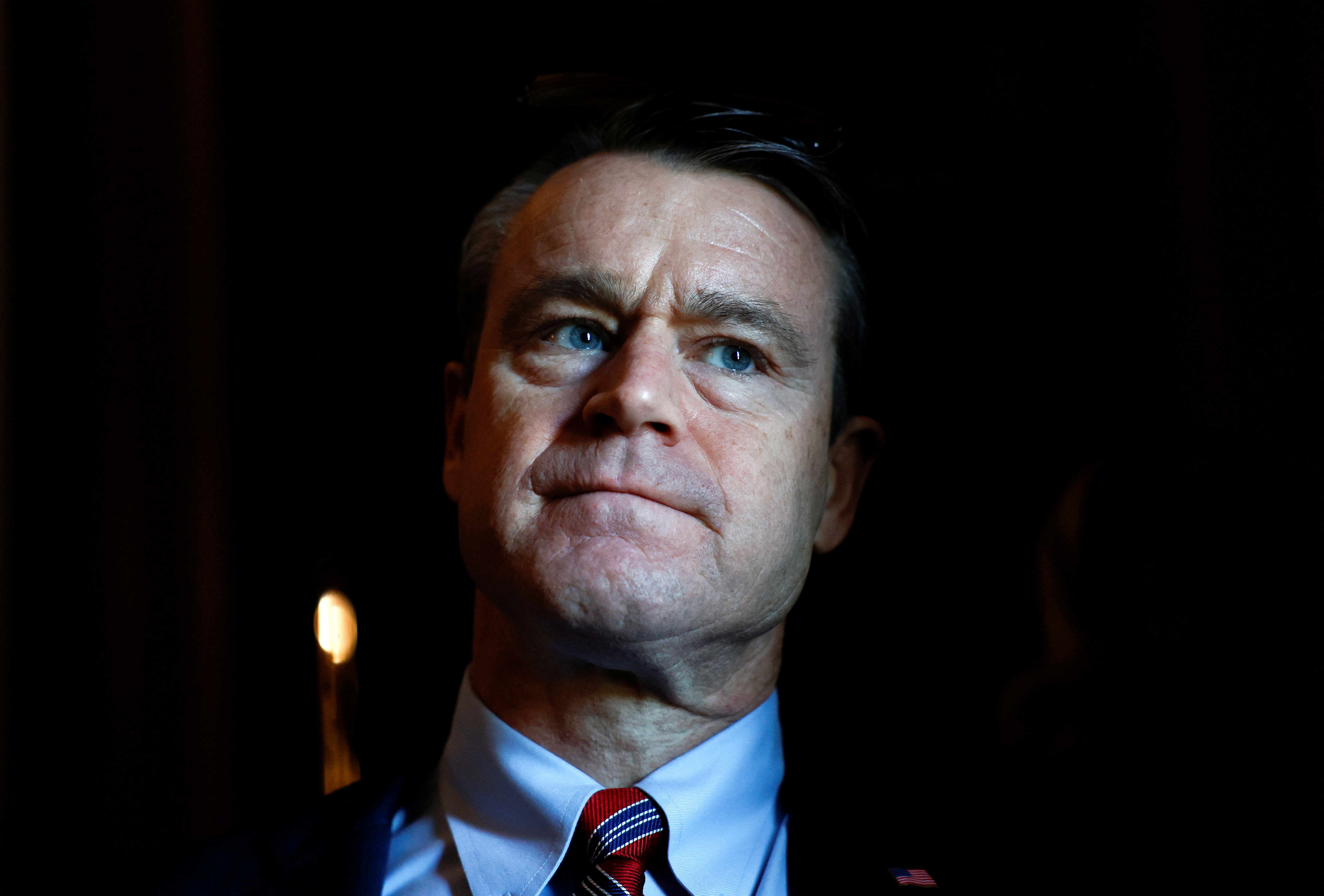 U.S. Senator Young speaks with reporters before the weekly Republican policy luncheon at the U.S. Capitol in Washington