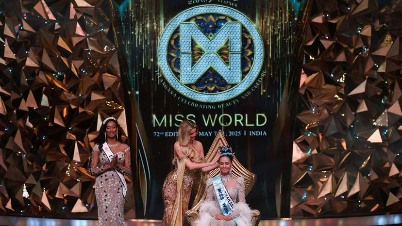 Thailand's Opal Suchata Chuangsri reacts after being crowned Miss World by last year's Miss World winner, Czech Republic's Krystyna Pyszkova, at the 72nd Miss World finale in Hyderabad