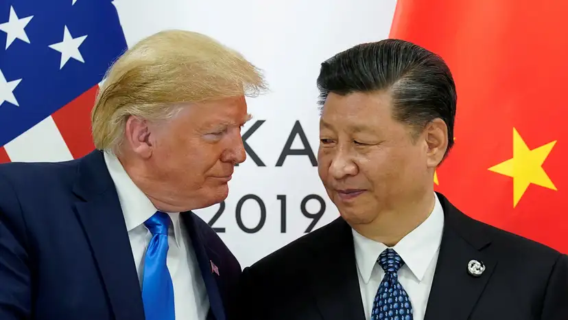 FILE PHOTO: Trump meets Xi at the G20 leaders summit in Osaka, Japan