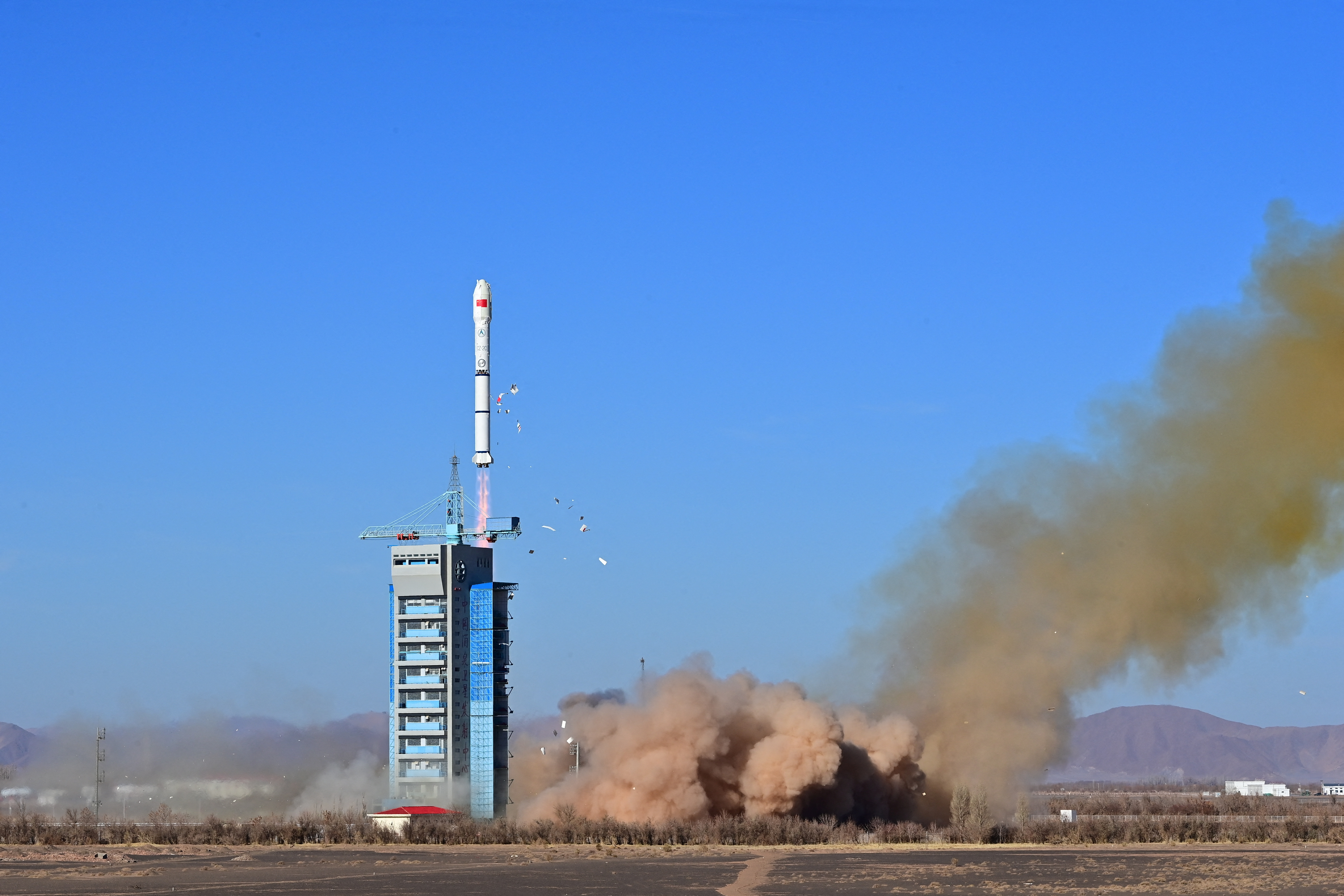 Long March-2C carrier rocket carrying satellite MISRSAT-2 takes off from the Jiuquan Satellite Launch Center