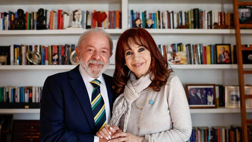 Brazil's President Luiz Inacio Lula da Silva poses for photos with Argentina's former President Cristina Kirchner, in Buenos Aires