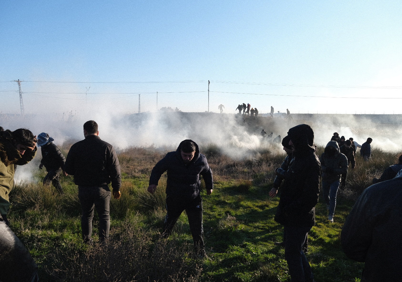 Turkey's pro-Kurdish demonstrators clash with riot police in Nusaybin as they march to the border zone with the Kurdish-controlled northeastern Syrian city of Qamishli