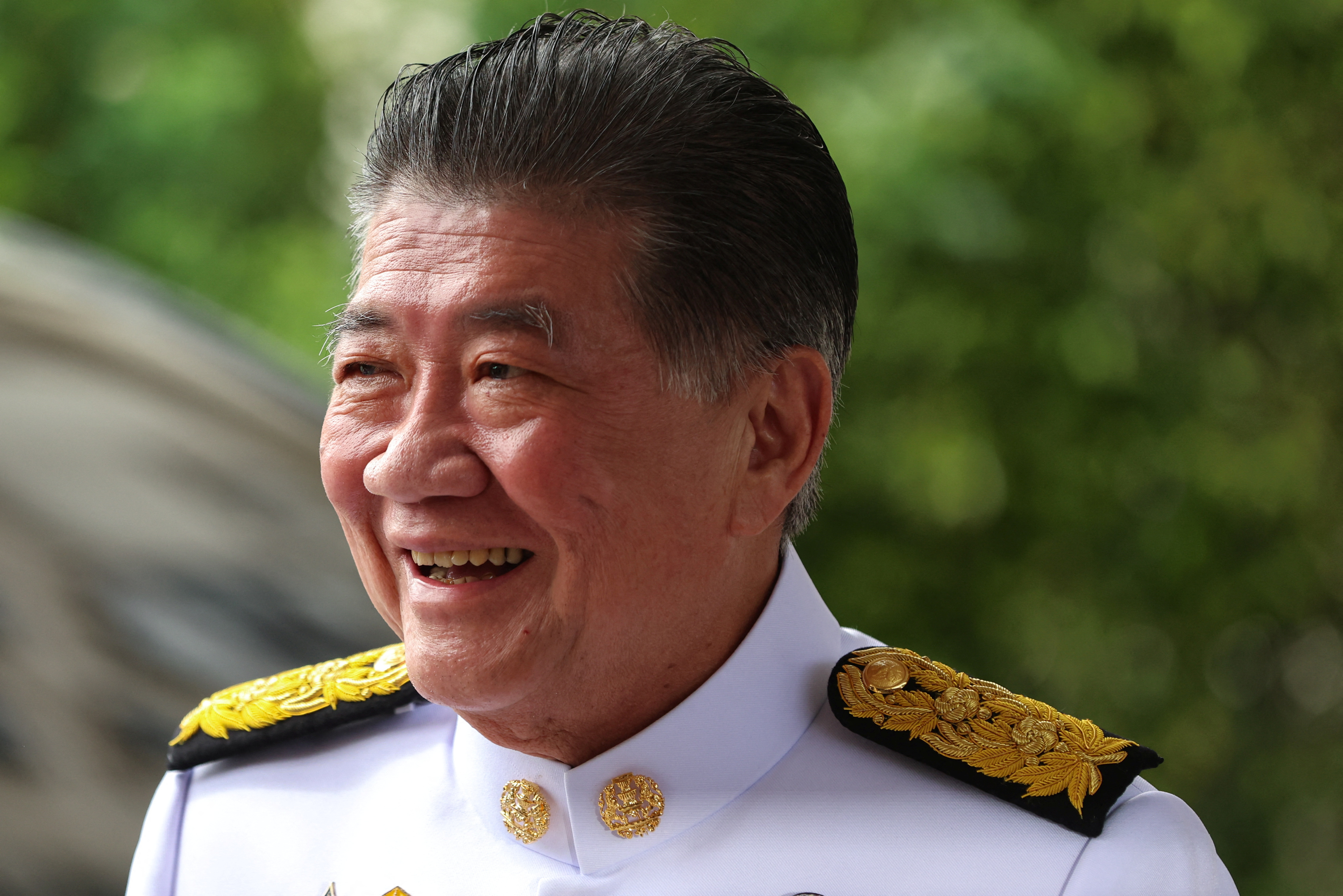 Thailand's new cabinet sworn in pledging loyalty to king in Bangkok