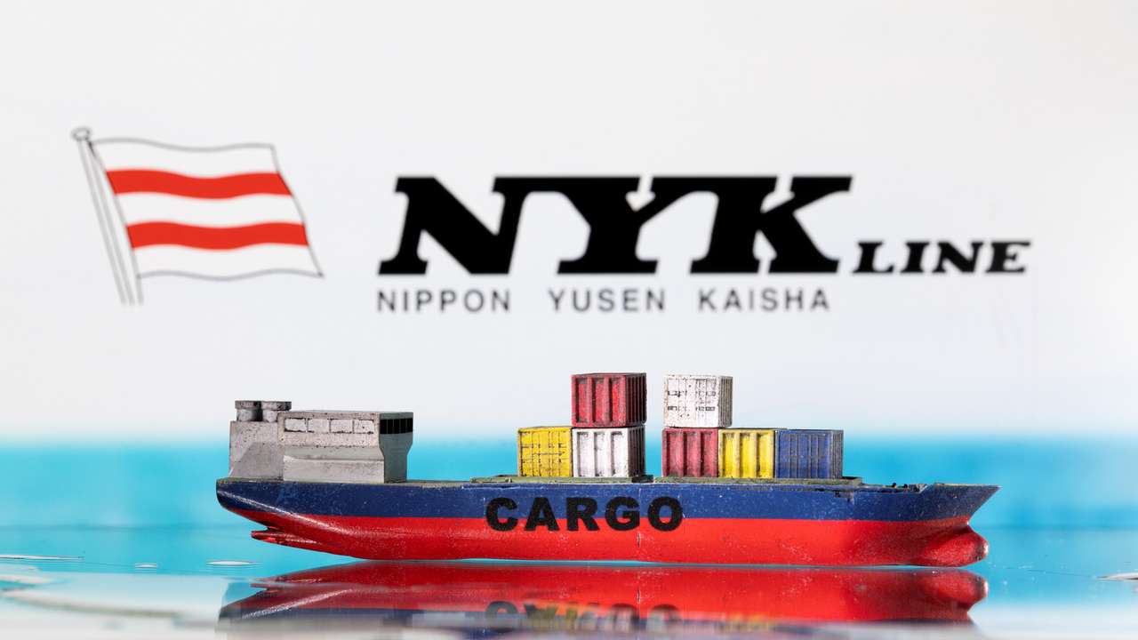 Illustration shows cargo boat model and Nippon Yusen (NYK) logo