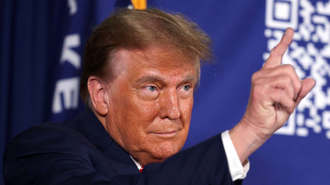 FILE PHOTO: Former U.S. President and Republican presidential candidate Donald Trump holds a rally in advance of the New Hampshire primary election in Laconia