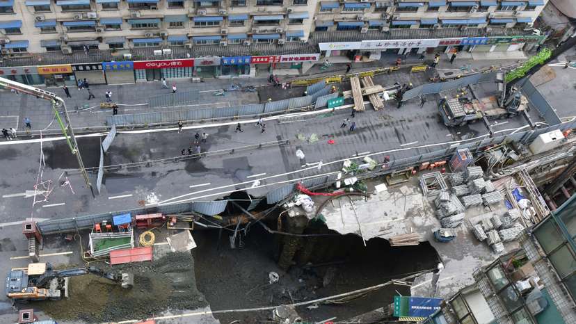 Sinkhole at a road section where a subway construction site collapsed, in Chengdu