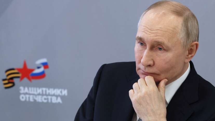 Russian President Vladimir Putin meets with employees and wards of the Defenders of the Fatherland state fund, in Moscow