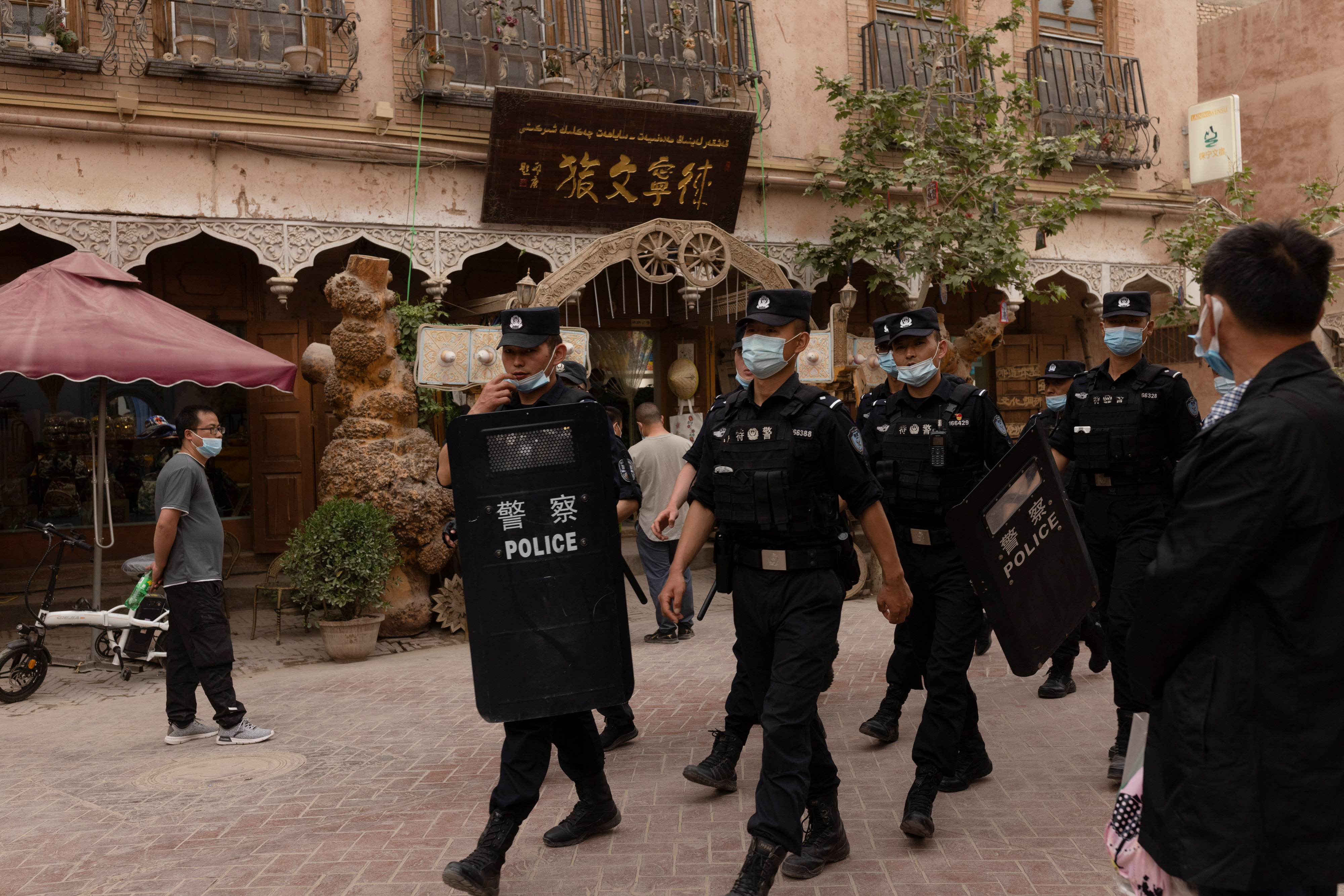 The Wider Image: In China's new Xinjiang: patriotic tourism, police and propaganda