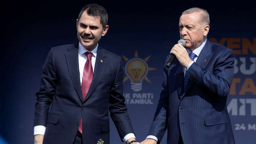 Turkey's President Erdogan and Murat Kurum greet their supporters during a rally in Istanbul
