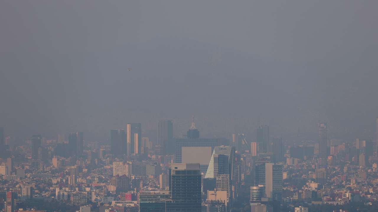 A general view of buildings and houses amid pollution on New Year's Day in Mexico City