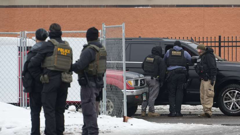 Members of U.S. Immigration and Customs Enforcement (ICE) conduct raids in Minneapolis