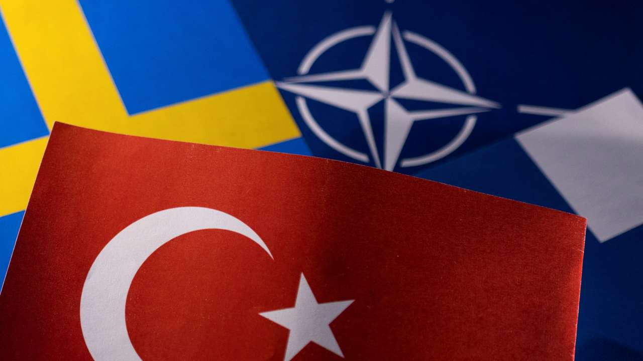 FILE PHOTO: Illustration shows NATO, Turkish, Swedish and Finnish flags