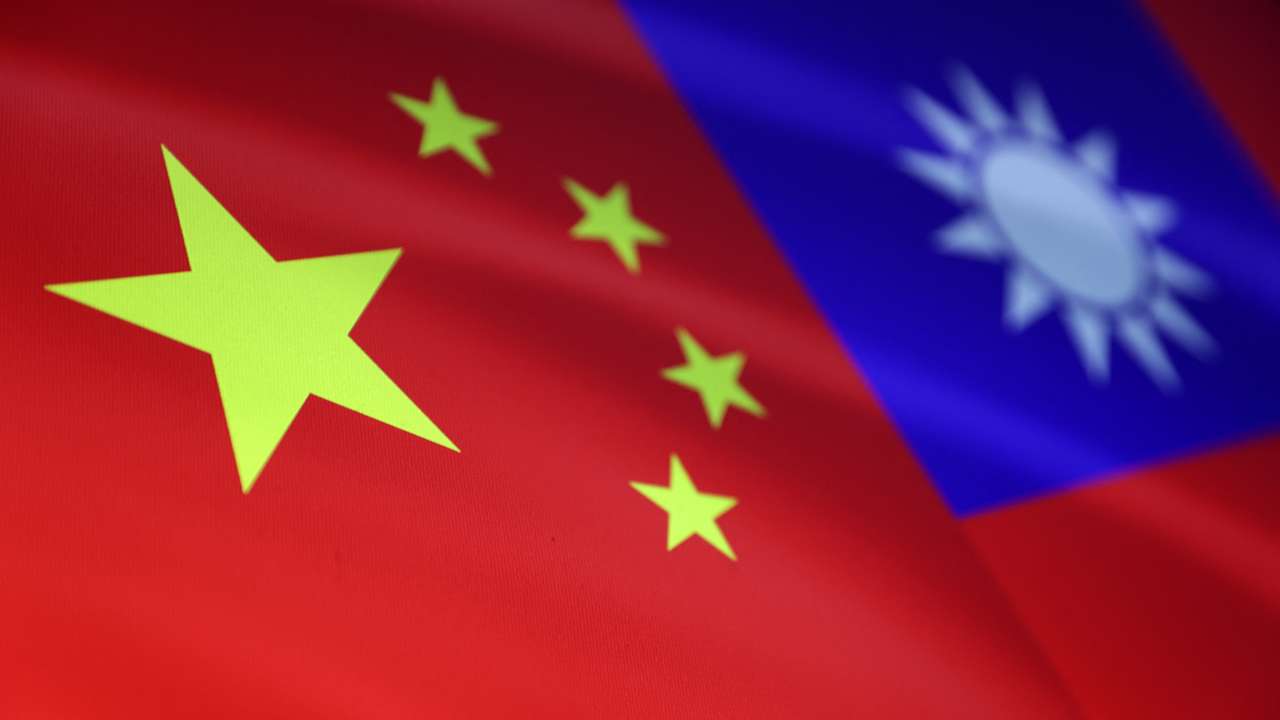 Illustration shows Chinese and Taiwanese flags