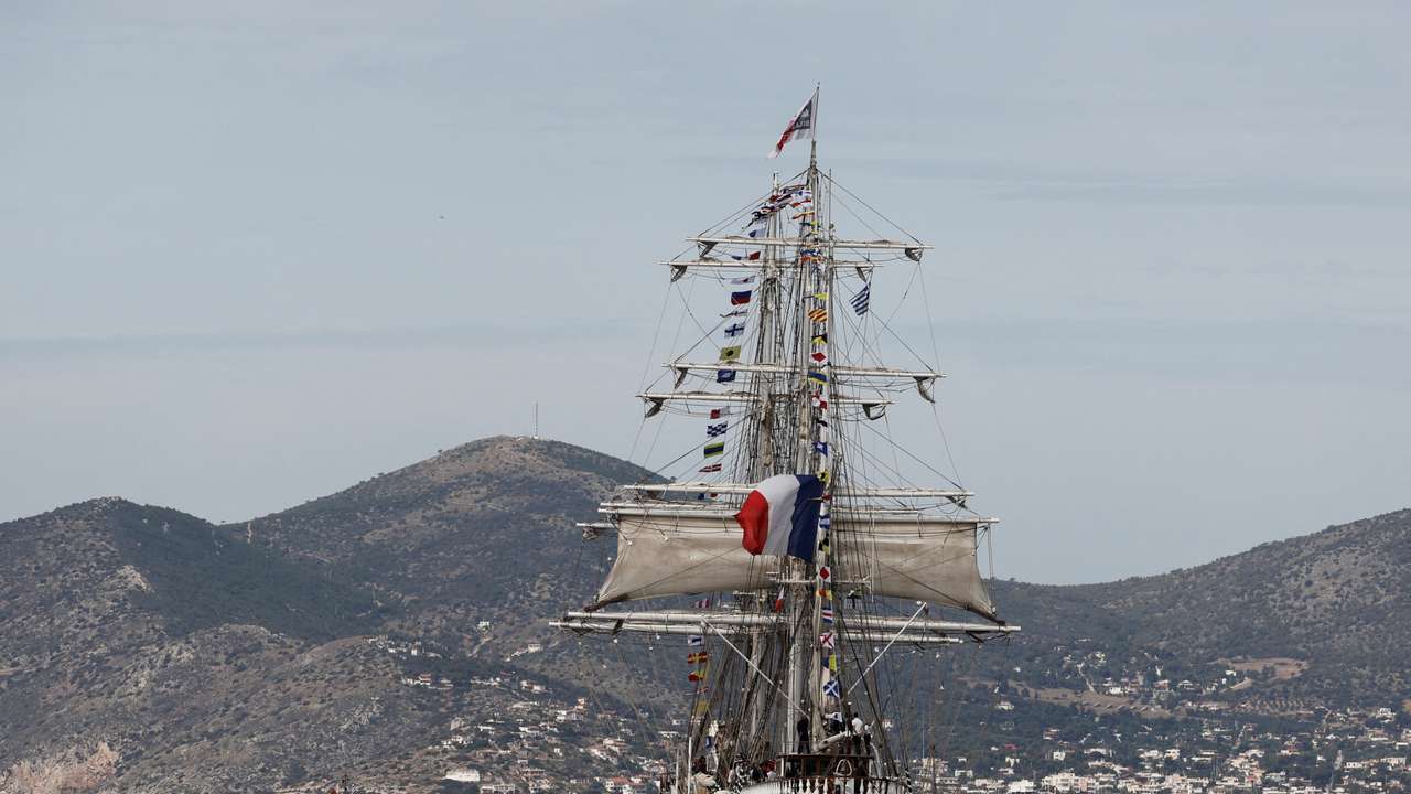 The Olympic flame departs Greece on the sailing ship Belem for the 2024 Paris Games