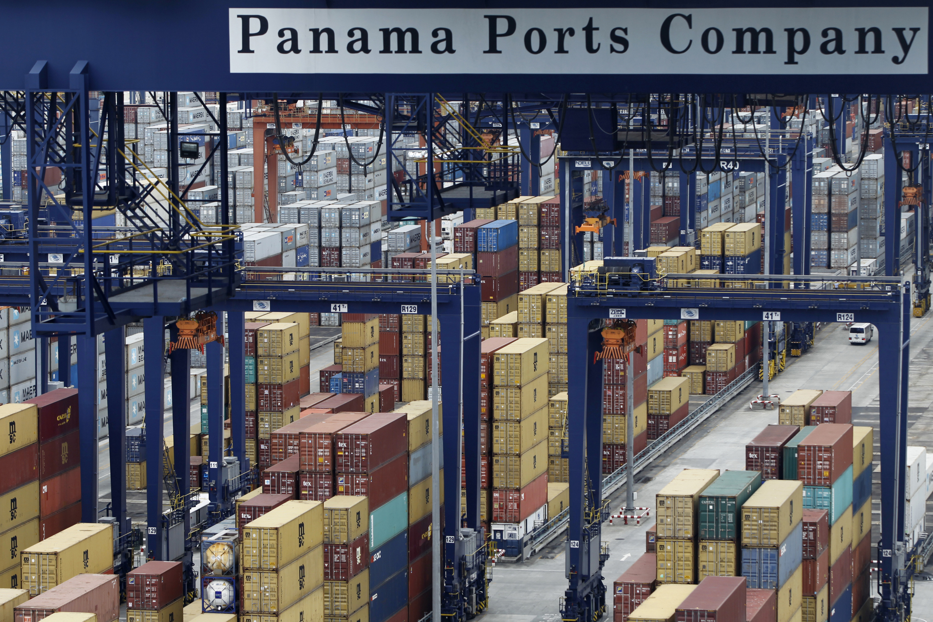 A Panama Ports Company sign is seen over containers at the Balboa port in Panama City