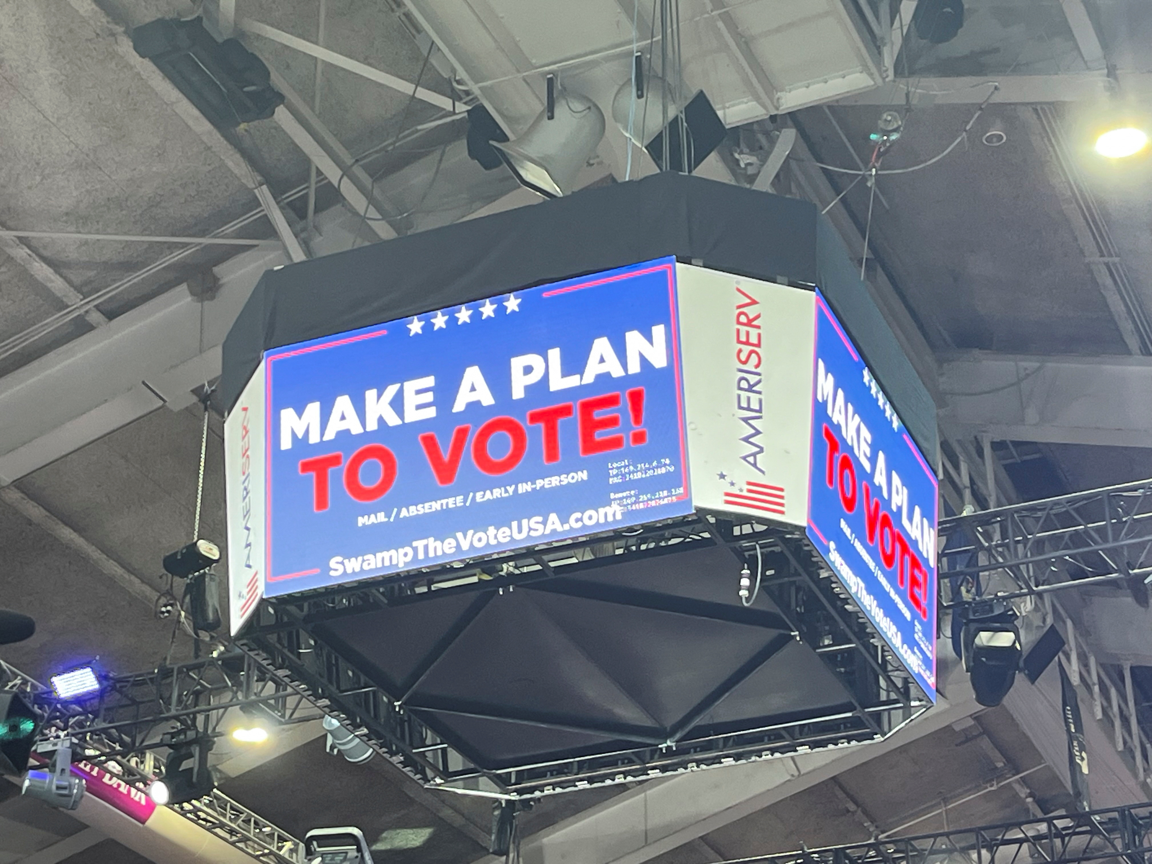 A view shows a jumbotron urging Trump supporters to make a plan to vote early or in-person on Election Day, during a campaign rally in Johnstown, Pennsylvania