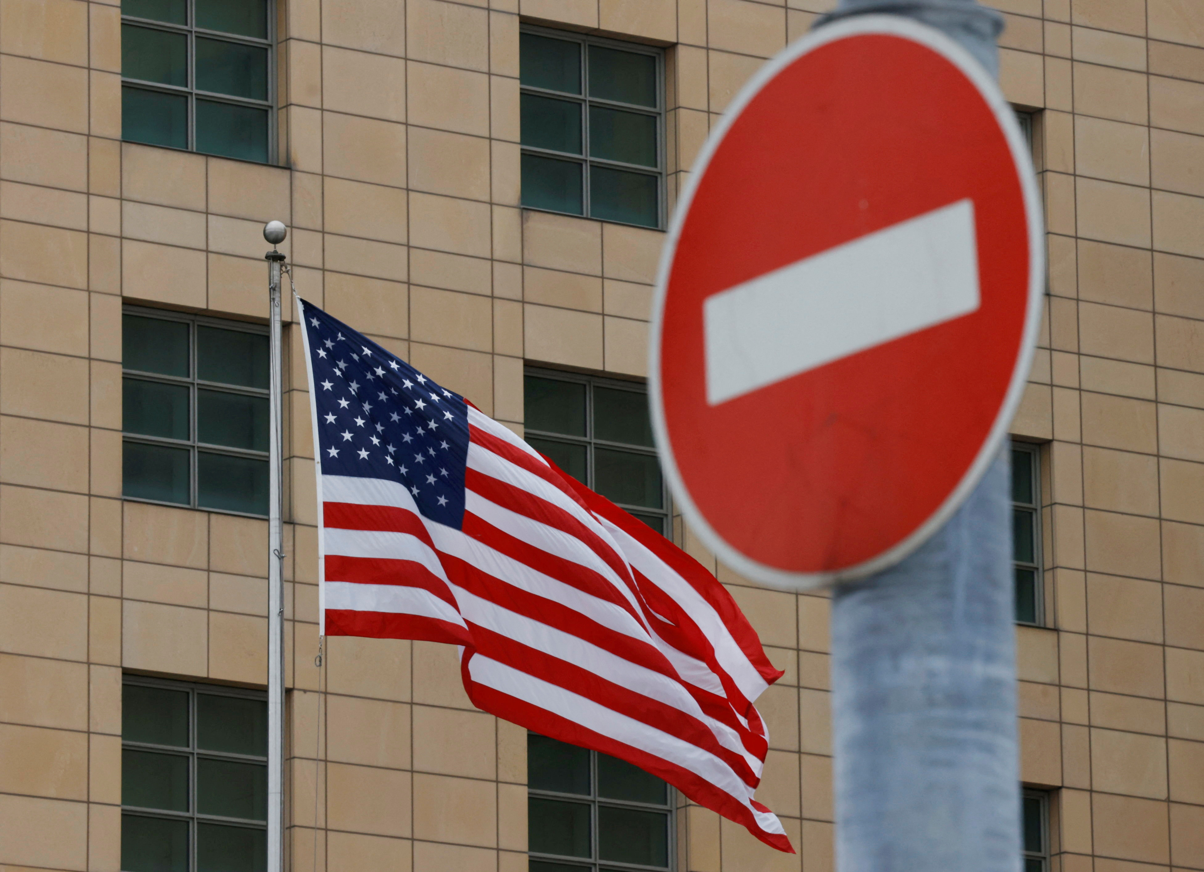 The U.S national flag flies in front of the U.S. Embassy in Moscow