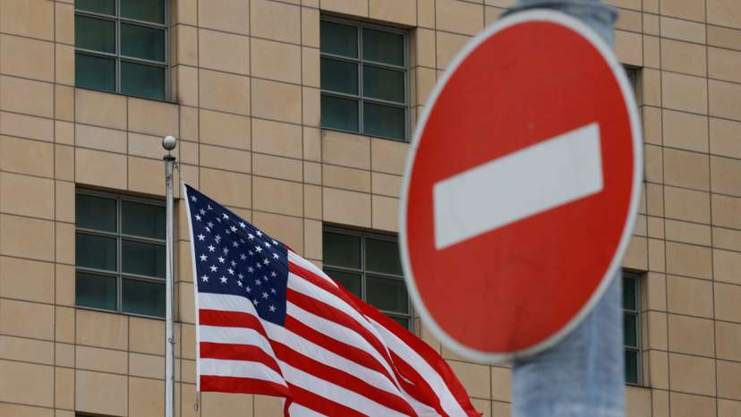 The U.S national flag flies in front of the U.S. Embassy in Moscow