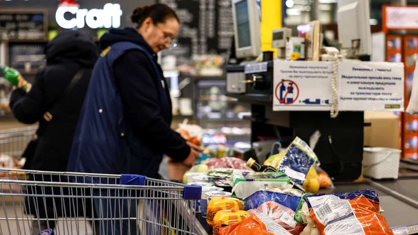 People shop at a Metro Cash and Carry hypermarket in Moscow