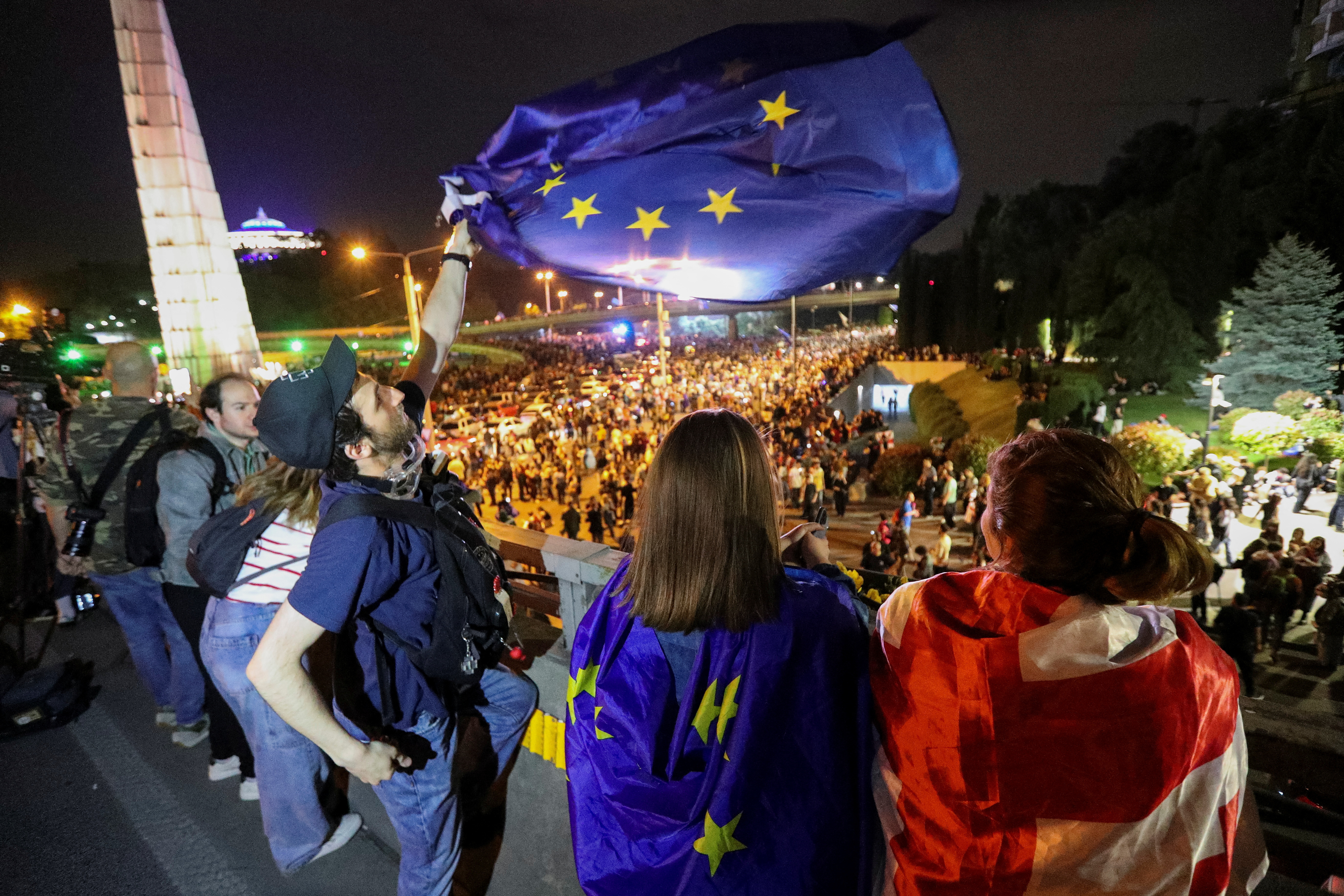 Demonstrators hold a rally to protest against a bill on "foreign agents", in Tbilisi