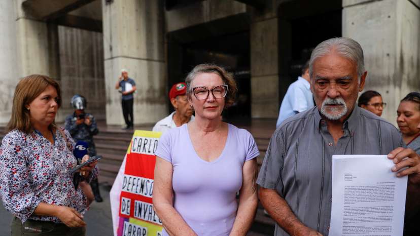 Mabel Calderin, the wife of Carlos Correa, director of press freedom NGO Espacio Publico, addresses the media, in Caracas