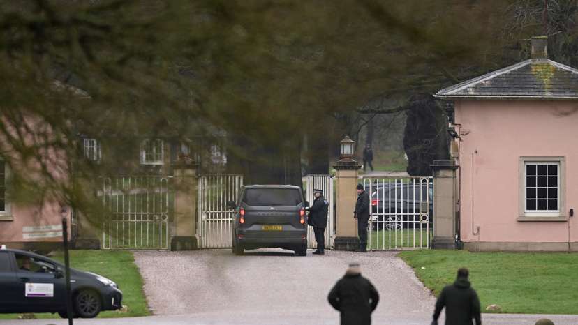 Police vehicles are parked outside Royal Lodge, amid a report of an arrest, in Windsor