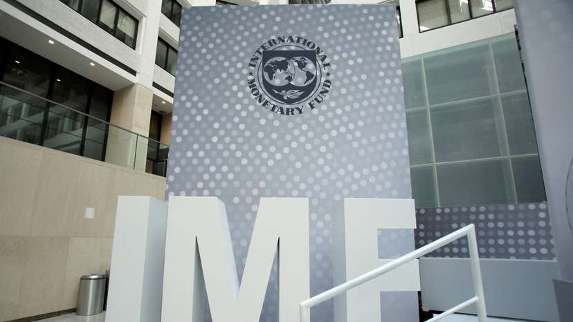 FILE PHOTO: International Monetary Fund logo is seen inside the headquarters at the end of the IMF/World Bank annual meetings