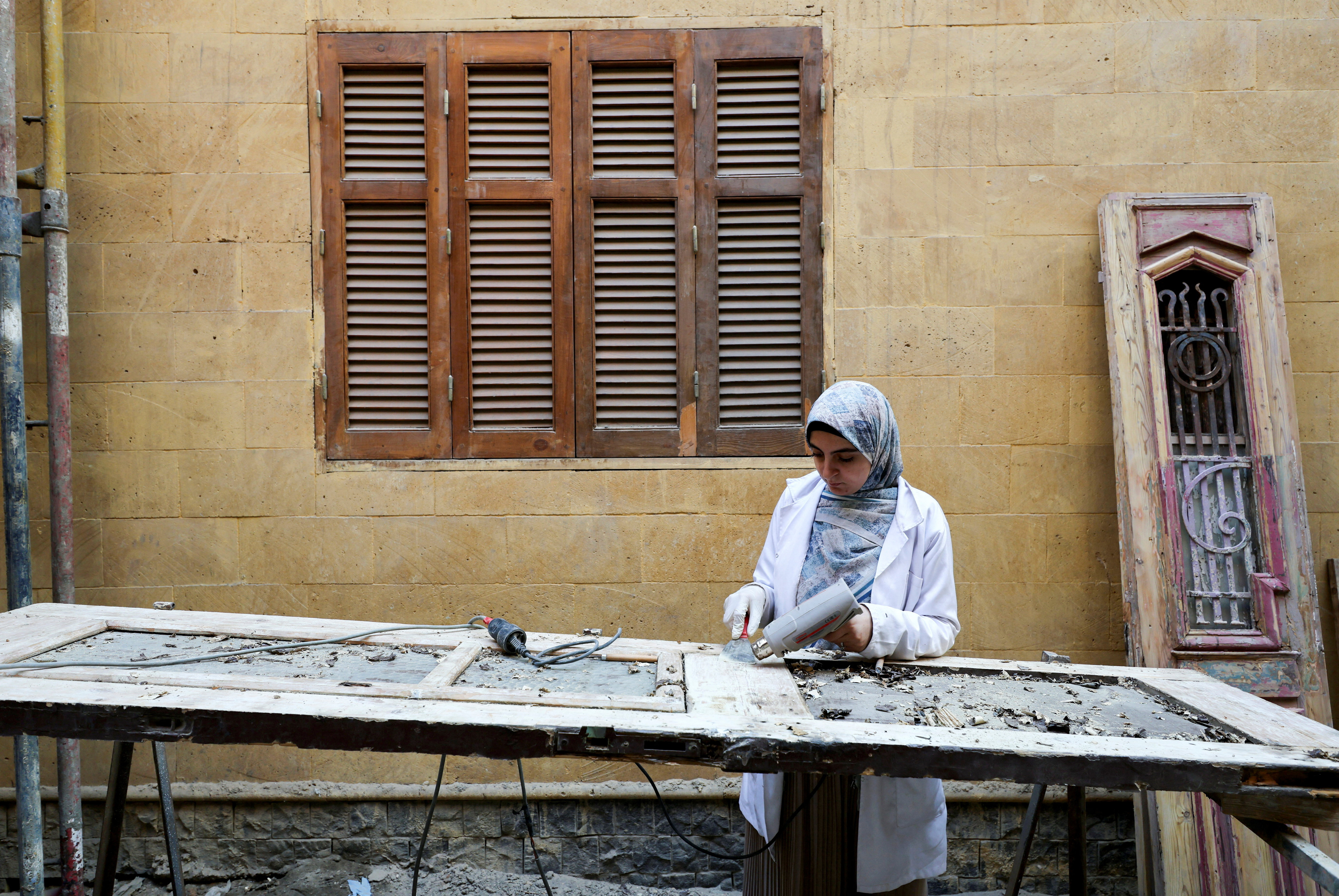 A restoration specialist works on-site at the Darb al-Labbana restoration project, designed to rebuild the historic yet dilapidated neighbourhood in old Cairo