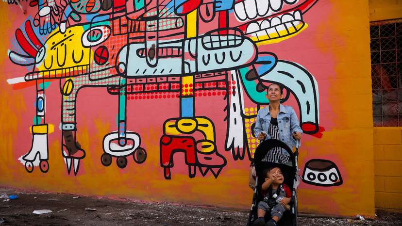 Artists seek to erase traces of violence with murals in a neighborhood in El Salvador