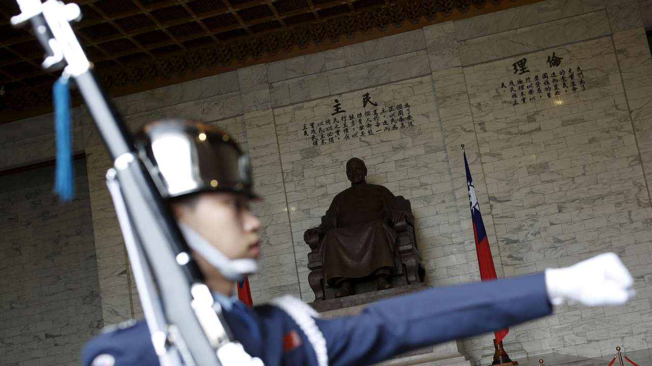 FILE PHOTO: FILE PHOTO: A military honor guard parade at the Chiang Kai-shek Memorial Hall in Taipei, Taiwan