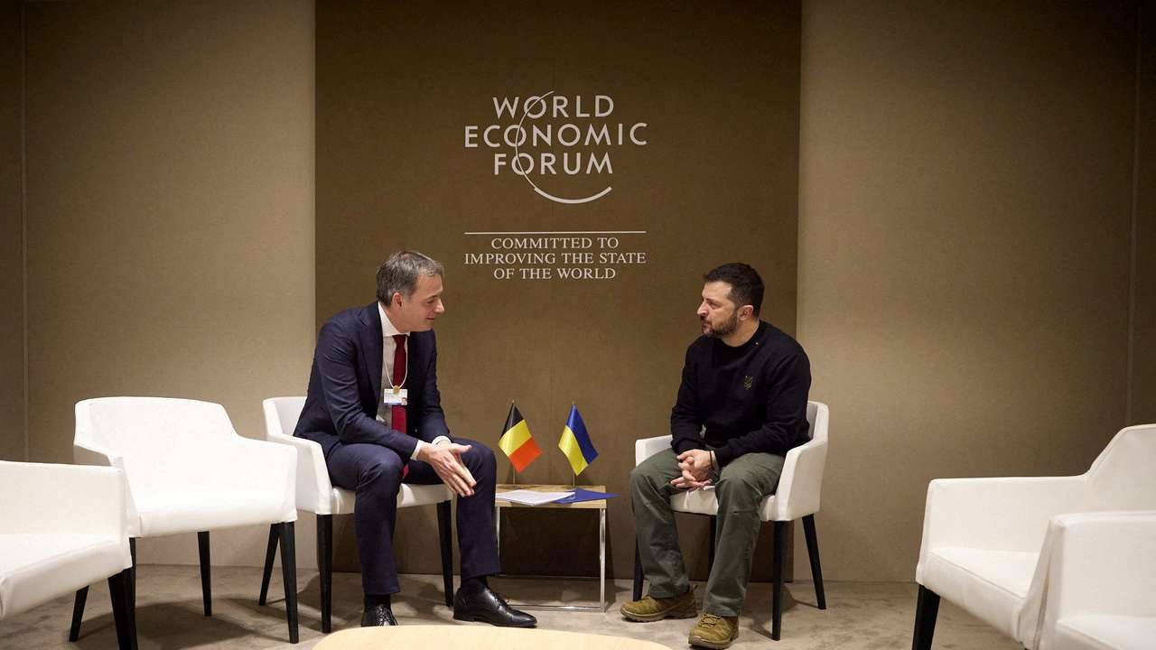 FILE PHOTO: Ukraine's President Zelenskiy and Belgium's Prime Minister De Croo attend a meeting in Davos