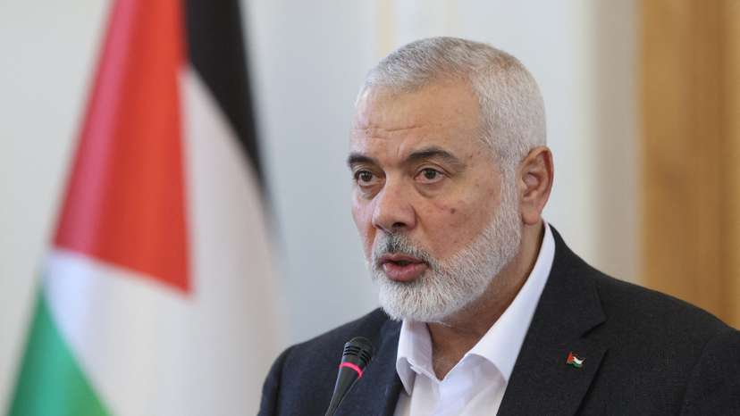 FILE PHOTO: Palestinian group Hamas' top leader, Ismail Haniyeh and Iran's Foreign Minister Hossein Amir Abdollahian attend a press conference in Tehran